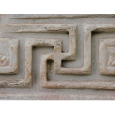 Swastika with long arms on a marble stone